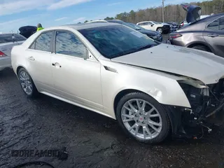 2012 Cadillac CTS Premium with VIN 1G6DP5E3XC0144157, listed as a IAAI auction lot 41311350 with 96,042 mi miles and . Bid and sale history available at DreamBid. Image 1.