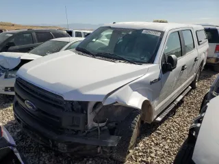 2018 Ford F-150 XL with VIN 1FTEW1EPXJKC63862, listed as a Copart auction lot 60927795 with 105,608 mi miles and Salvage title. Bid and sale history available at DreamBid. Image 1.