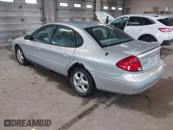 2003 Ford Taurus SES Standard with VIN 1FAFP55U13G222465, listed as a IAAI auction lot 42168336 with 128,078 mi miles. Bid and sale history available at carsss.com. Image 3.
