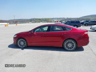 2016 Ford Fusion SE with VIN 3FA6P0T94GR176730, listed as a IAAI auction lot 41980409 with 164,904 mi miles. Bid and sale history available at carsss.com. Image 14.