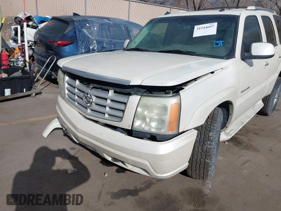 2003 Cadillac Escalade z VIN 1GYEK63N53R304400, wystawiony jako IAAI lot #41544697 z przebiegiem 207 913 mil mil oraz . Historia ofert i sprzedaży dostępna na DreamBid. Obrazek 6.