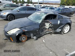 2006 Nissan 350Z Touring z VIN JN1AZ34D66M300672, wystawiony jako Copart lot #78670664 z przebiegiem 169 547 mil mil oraz Szkoda całkowita • Salvage title. Historia ofert i sprzedaży dostępna na DreamBid. Obrazek 1.