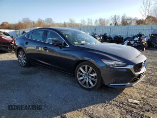 2021 Mazda 6 Carbon Edition with VIN JM1GL1WY3M1616400, listed as a Copart auction lot 78985274 with 84,255 mi miles and Salvage Title. Bid and sale history available at DreamBid. Image 4.