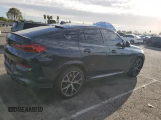 2021 BMW X6 xDrive40i with VIN 5UXCY6C04M9H02068, listed as a Copart auction lot 46938645 with 21,913 mi miles and Salvage Title. Bid and sale history available at carsss.com. Image 3.