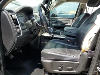 2014 Ram 1500 Lone Star z VIN 1C6RR6LG5ES114085, wystawiony jako Copart lot #66417334 z przebiegiem 168 847 mil mil oraz Szkoda całkowita • Salvage title. Historia ofert i sprzedaży dostępna na DreamBid. Obrazek 7.
