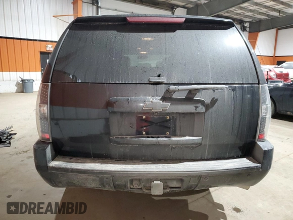 2010 Chevrolet Suburban LTZ with VIN 1GNUKKE38AR283830, listed as a Copart auction lot 84887104 with 298,548 mi miles and Salvage Title. Bid and sale history available at carsss.com. Image 6.