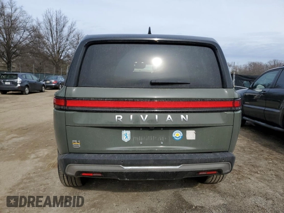 2022 Rivian R1S Launch Edition z VIN 7PDSGABL4NN000393, wystawiony jako Copart lot #44218005 z przebiegiem 26 598 mil mil oraz Szkoda całkowita • Salvage title. Historia ofert i sprzedaży dostępna na DreamBid. Obrazek 6.