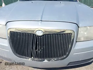 2007 Chrysler 300 with VIN 2C3KA43R67H664434, listed as a IAAI auction lot 41884172 with 238,451 mi miles. Bid and sale history available at carsss.com. Image 6.