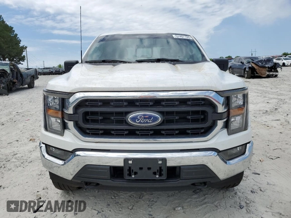 2023 Ford F-150 XL with VIN 1FTFW1E85PKG17275, listed as a Copart auction lot 57497155 with 34,379 mi miles and Salvage title. Bid and sale history available at DreamBid. Image 5.