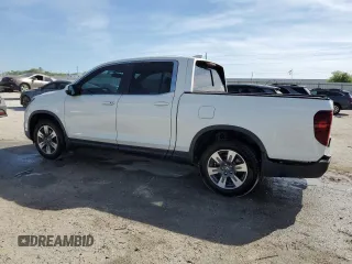 2019 Honda Ridgeline RTL-T with VIN 5FPYK2F62KB002624, listed as a Copart auction lot 50142765 with 62,947 mi miles and Salvage title. Bid and sale history available at DreamBid. Image 2.