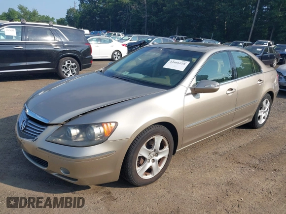 2006 Acura RL z VIN JH4KB16596C005876, wystawiony jako IAAI lot #42666228 z przebiegiem 146 897 mil mil oraz . Historia ofert i sprzedaży dostępna na DreamBid. Obrazek 2.