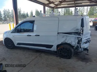 2020 Ford Transit Connect XLT z VIN NM0LS7F27L1447428, wystawiony jako IAAI lot #41892673 z przebiegiem 153 602 mil mil oraz . Historia ofert i sprzedaży dostępna na DreamBid. Obrazek 14.