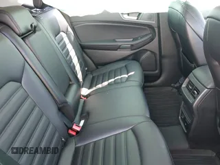 2022 Ford Edge SEL z VIN 2FMPK4J91NBA64868, wystawiony jako IAAI lot #38954615 z przebiegiem 33 911 mil mil oraz . Historia ofert i sprzedaży dostępna na DreamBid. Obrazek 8.