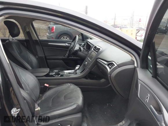 2013 Ford Fusion Titanium with VIN 3FA6P0D99DR130031, listed as a IAAI auction lot 41885596 with 174,687 mi miles. Bid and sale history available at carsss.com. Image 5.