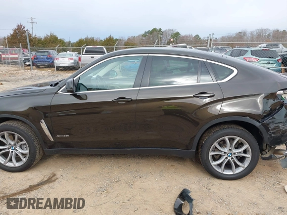 2015 BMW X6 xDrive35i z VIN 5UXKU2C56F0N76862, wystawiony jako IAAI lot #41747776 z przebiegiem 119 426 mil mil oraz . Historia ofert i sprzedaży dostępna na DreamBid. Obrazek 15.