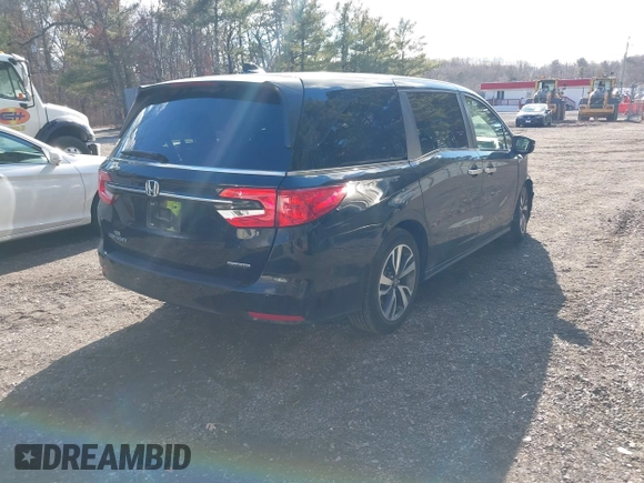 2024 Honda Odyssey Touring z VIN 5FNRL6H89RB042354, wystawiony jako IAAI lot #41469495 z przebiegiem 8 477 mil mil oraz . Historia ofert i sprzedaży dostępna na DreamBid. Obrazek 4.