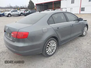 2014 Volkswagen Jetta TDI with VIN 3VWLL7AJ0EM389924, listed as a IAAI auction lot 41271290 with 241,452 mi miles and . Bid and sale history available at DreamBid. Image 4.
