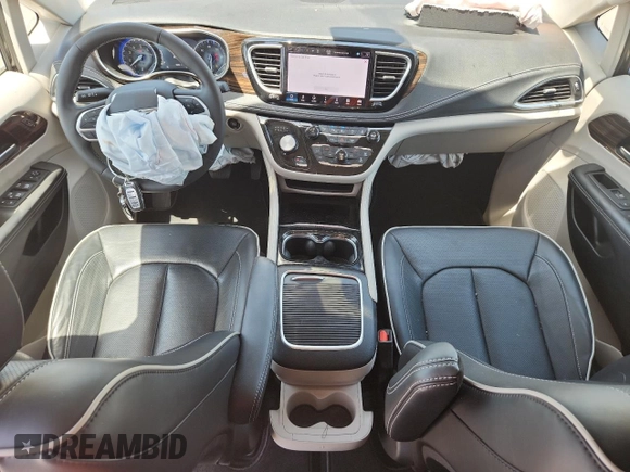 2023 Chrysler Pacifica Limited with VIN 2C4RC3GG8PR604835, listed as a Copart auction lot 57661325 with 33,232 mi miles and Salvage title. Bid and sale history available at DreamBid. Image 8.