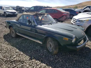 1972 FIAT 124 Spider z VIN 124CS10127996, wystawiony jako Copart lot #69366834 z przebiegiem 7 880 mil mil oraz Szkoda całkowita • Salvage title. Historia ofert i sprzedaży dostępna na DreamBid. Obrazek 4.