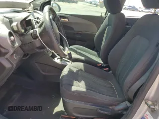 2014 Chevrolet Sonic LT with VIN 1G1JC5SH0E4148279, listed as a Copart auction lot 52308785 with 96,175 mi miles and Salvage Title. Bid and sale history available at DreamBid. Image 7.