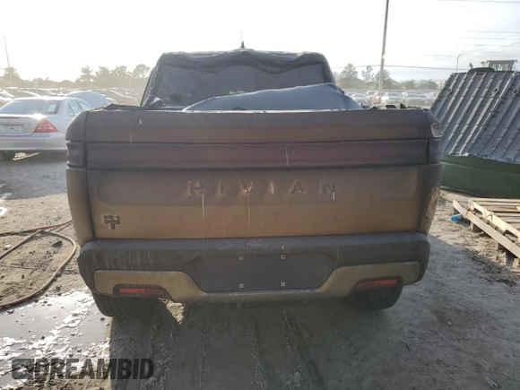 2023 Rivian R1T Adventure z VIN 7FCTGBAA6PN028517, wystawiony jako Copart lot #73712354 z przebiegiem Nie podano mil oraz Nie do naprawy. Historia ofert i sprzedaży dostępna na DreamBid. Obrazek 6.