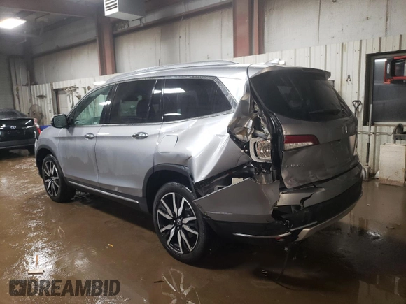 2021 Honda Pilot Elite with VIN 5FNYF6H04MB053008, listed as a Copart auction lot 87802955 with 70,737 mi miles and Salvage Title. Bid and sale history available at carsss.com. Image 2.