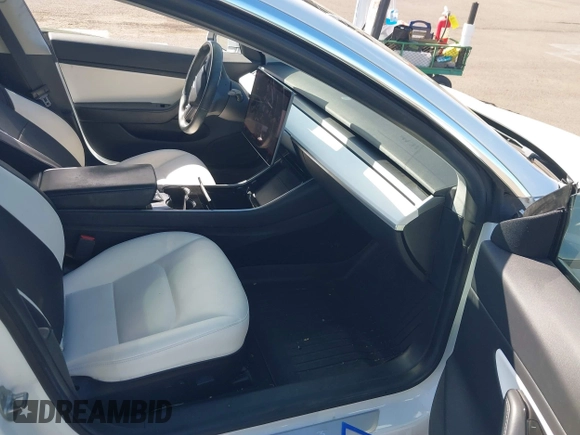 2019 Tesla Model 3 Long Range with VIN 5YJ3E1EBXKF413806, listed as a IAAI auction lot 41321906 with 24,635 mi miles. Bid and sale history available at carsss.com. Image 5.