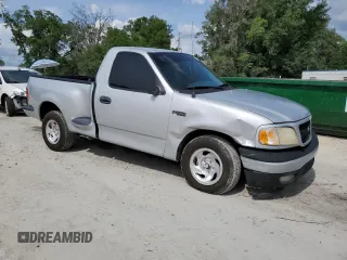 2000 Ford F-150 XL with VIN 1FTZF1727YNB38782, listed as a Copart auction lot 55749405 with 195,440 mi miles and Salvage title. Bid and sale history available at DreamBid. Image 4.