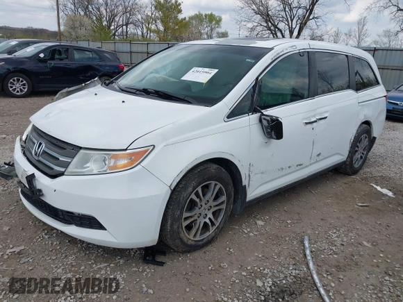 2012 Honda Odyssey EX-L with VIN 5FNRL5H67CB082903, listed as a IAAI auction lot 42015904 with 208,300 mi miles and . Bid and sale history available at carsss.com. Image 2.