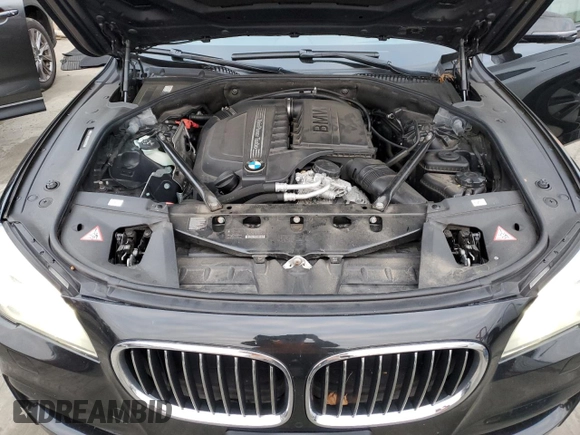 2014 BMW 7 Series 740Li xDrive with VIN WBAYF4C59ED281776, listed as a Copart auction lot 83563234 with 77,899 mi miles and Salvage Title. Bid and sale history available at carsss.com. Image 11.