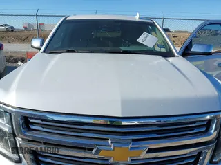 2016 Chevrolet Tahoe LTZ with VIN 1GNSKCKC0GR203348, listed as a IAAI auction lot 42220438 with 108,657 mi miles and . Bid and sale history available at DreamBid. Image 6.