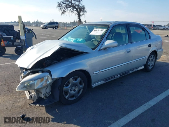 1999 Honda Civic EX with VIN JHMEJ8648XS000823, listed as a IAAI auction lot 41479594 with 299,294 mi miles. Bid and sale history available at carsss.com. Image 2.