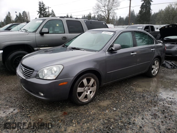 2007 Kia Optima EX with VIN KNAGE124375134243, listed as a Copart auction lot 86664454 with 136,700 mi miles and Salvage Title. Bid and sale history available at carsss.com. Image 1.