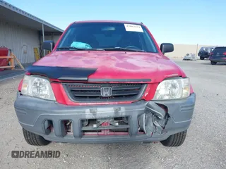 2001 Honda CR-V LX z VIN JHLRD184X1C019070, wystawiony jako IAAI lot #42063424 z przebiegiem 336 077 mil mil oraz . Historia ofert i sprzedaży dostępna na DreamBid. Obrazek 6.