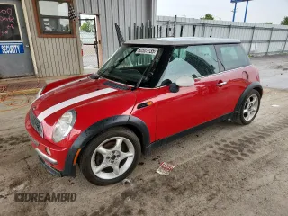 2004 MINI Hardtop with VIN WMWRC33474TJ59565, listed as a Copart auction lot 60507235 with 88,920 mi miles and Salvage title. Bid and sale history available at DreamBid. Image 1.