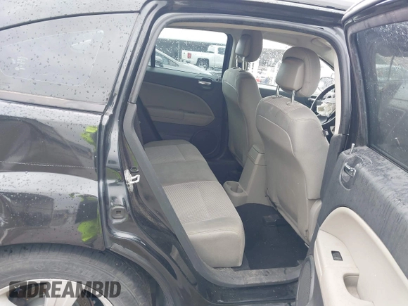 2010 Dodge Caliber Mainstreet z VIN 1B3CB3HA5AD643719, wystawiony jako IAAI lot #41940088 z przebiegiem 173 204 mil mil oraz . Historia ofert i sprzedaży dostępna na DreamBid. Obrazek 8.