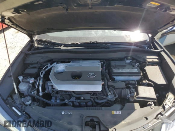 2022 Lexus UX with VIN JTHX3JBH9N2053479, listed as a Copart auction lot 70495194 with 36,481 mi miles and Salvage Title. Bid and sale history available at carsss.com. Image 12.