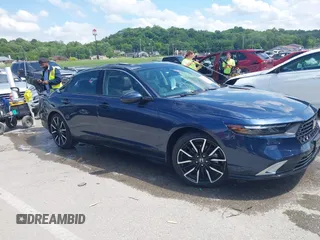 2023 Honda Accord Touring with VIN 1HGCY2F81PA048434, listed as a IAAI auction lot 42306343 with 14,878 mi miles and . Bid and sale history available at DreamBid. Image 13.
