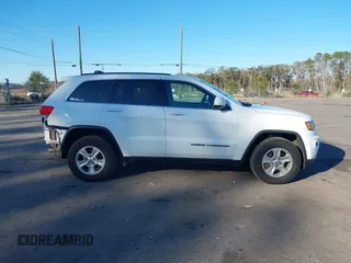 2017 Jeep Grand Cherokee Laredo with VIN 1C4RJFAG7HC688625, listed as a IAAI auction lot 41295860 with 115,714 mi miles. Bid and sale history available at carsss.com. Image 13.