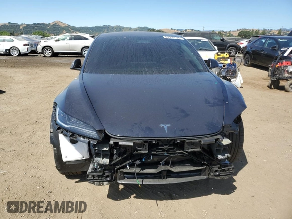 2025 Tesla Model 3 Long Range with VIN 5YJ3E1EA9SF910112, listed as a Copart auction lot 57993525 with 4,645 mi miles and Salvage title. Bid and sale history available at DreamBid. Image 5.
