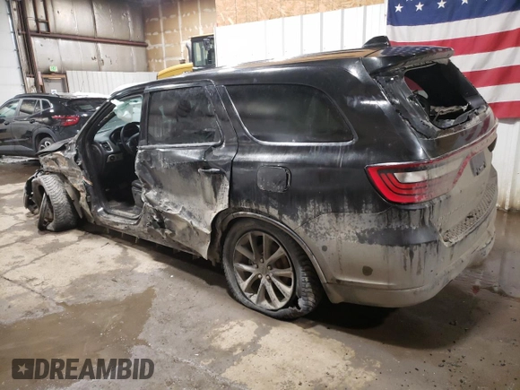 2014 Dodge Durango R/T with VIN 1C4SDJCT9EC977300, listed as a Copart auction lot 49930435 with 165,569 mi miles and Salvage title. Bid and sale history available at DreamBid. Image 2.