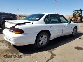 1999 Pontiac Bonneville SE z VIN 1G2HX52K3XH226172, wystawiony jako Copart lot #71655164 z przebiegiem 242 429 mil mil oraz Szkoda całkowita • Salvage title. Historia ofert i sprzedaży dostępna na DreamBid. Obrazek 3.
