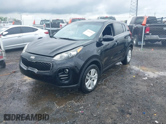2018 Kia Sportage LX z VIN KNDPMCAC3J7335212, wystawiony jako IAAI lot #42092564 z przebiegiem 126 691 mil mil oraz . Historia ofert i sprzedaży dostępna na DreamBid. Obrazek 2.