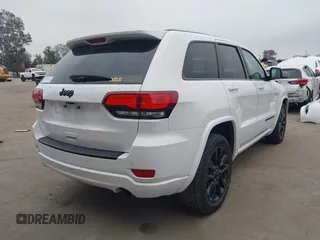 2017 Jeep Grand Cherokee Laredo with VIN 1C4RJEAG9HC805132, listed as a IAAI auction lot 42034175 with 120,949 mi miles and . Bid and sale history available at DreamBid. Image 4.