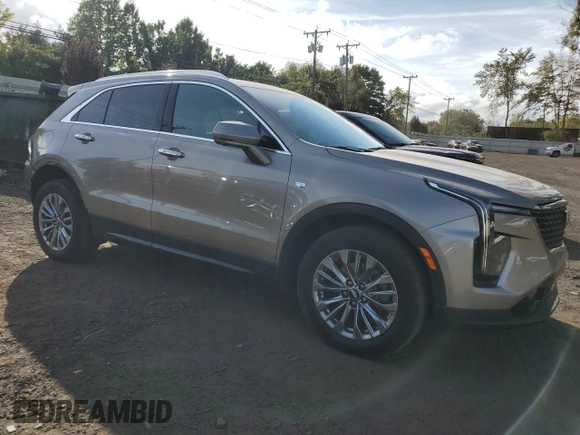 2024 Cadillac XT4 AWD Premium Luxury with VIN 1GYFZDR40RF219252, listed as a Copart auction lot 72446334 with 2,544 mi miles and Salvage title. Bid and sale history available at DreamBid. Image 4.
