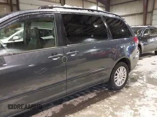 2009 Toyota Sienna XLE with VIN 5TDBK22C29S028110, listed as a IAAI auction lot 41496169 with 253,057 mi miles and . Bid and sale history available at DreamBid. Image 12.