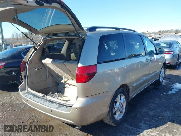 2005 Toyota Sienna XLE with VIN 5TDZA22C95S365448, listed as a IAAI auction lot 41552969 with 214,462 mi miles and . Bid and sale history available at DreamBid. Image 4.