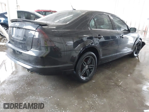 2012 Ford Fusion SE z VIN 3FAHP0HA5CR403929, wystawiony jako IAAI lot #42353429 z przebiegiem 208 668 mil mil oraz . Historia ofert i sprzedaży dostępna na DreamBid. Obrazek 4.