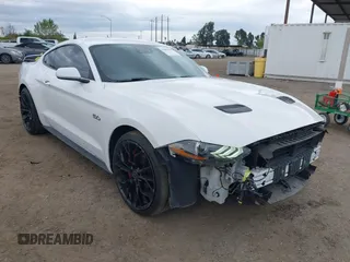 2021 Ford Mustang GT z VIN 1FA6P8CF7M5110160, wystawiony jako IAAI lot #41885188 z przebiegiem 75 799 mil mil oraz . Historia ofert i sprzedaży dostępna na DreamBid. Obrazek 1.