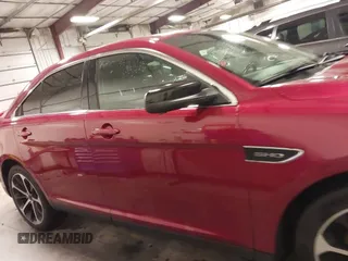 2014 Ford Taurus SHO with VIN 1FAHP2KT9EG130834, listed as a IAAI auction lot 41748199 with 98,857 mi miles and . Bid and sale history available at carsss.com. Image 14.